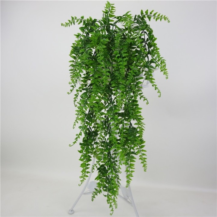 Plastic fern grass plant green