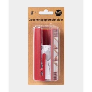 Coupe papier cadeau et film plastique rouge
